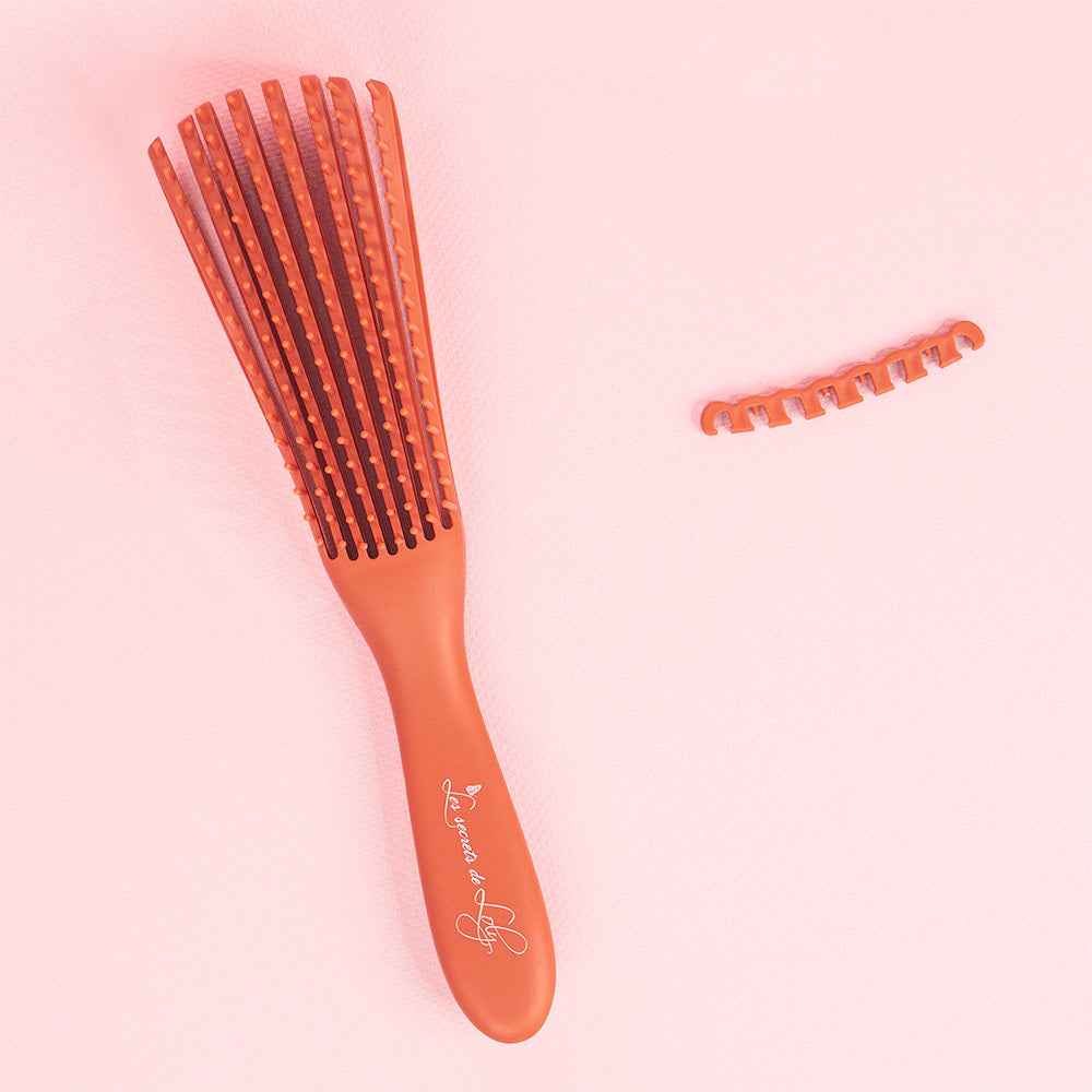 Magic Brush - La brosse qui démêle en douceur sous la douche