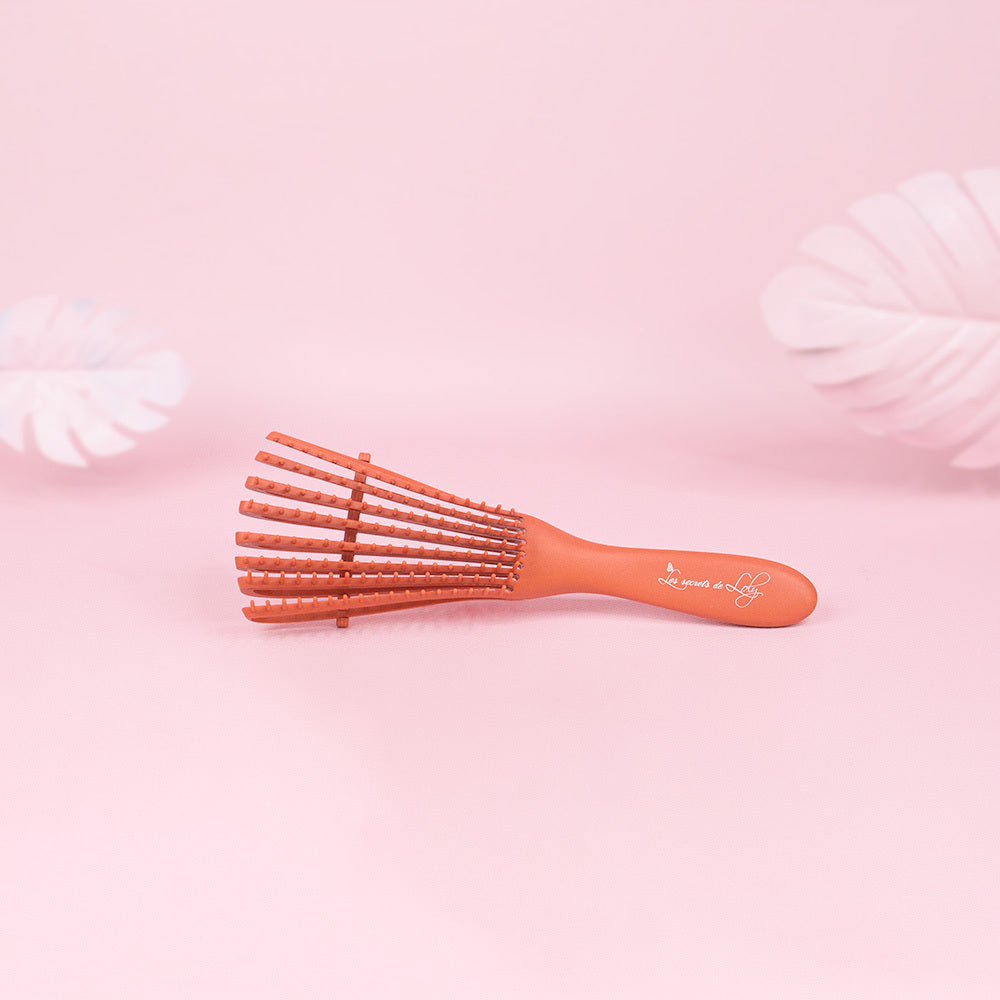 Magic Brush - La brosse qui démêle en douceur sous la douche