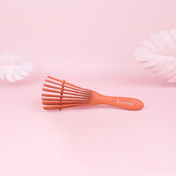 Magic Brush - La brosse qui démêle en douceur sous la douche
